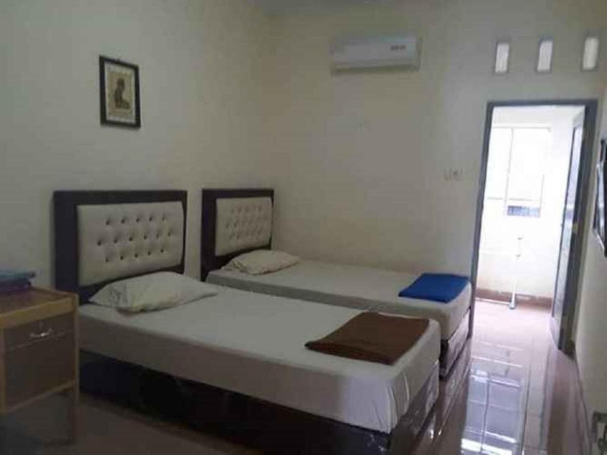 เปงีนาปัน ชาเรียะฮ์ Hotel Parit  ภายนอก รูปภาพ