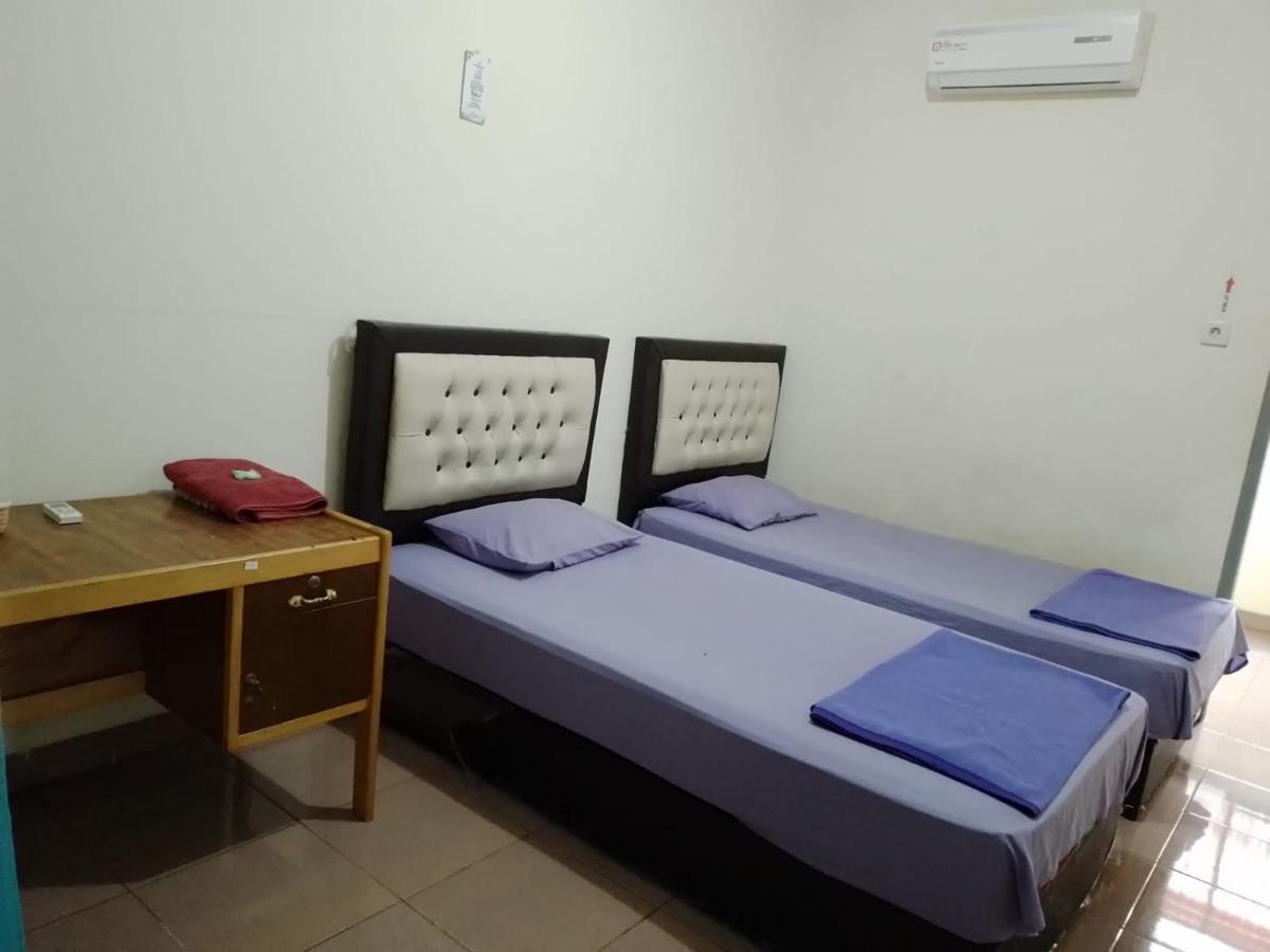 เปงีนาปัน ชาเรียะฮ์ Hotel Parit  ภายนอก รูปภาพ